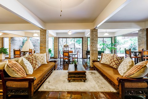 a living room with couches and a coffee table